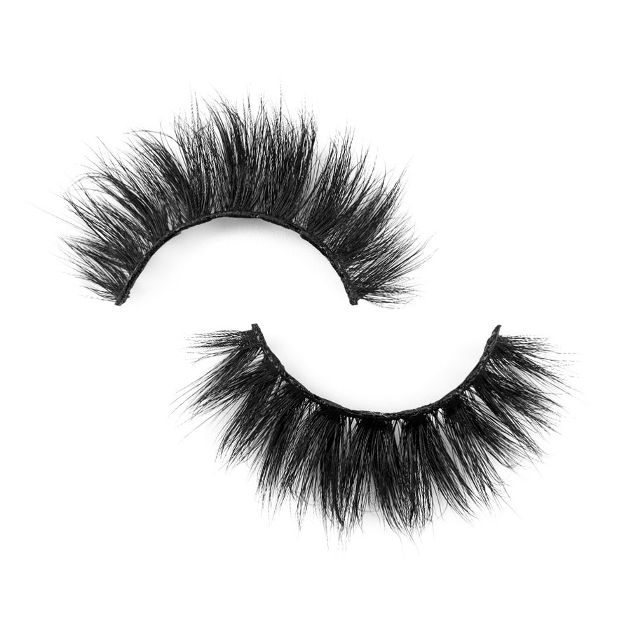 Suntarah Beauty False Strip Eyelash in F-109 lying flat against white backdrop..  A Dramatic, Glamorous Lash with Maximum Volume and Round Shape.
